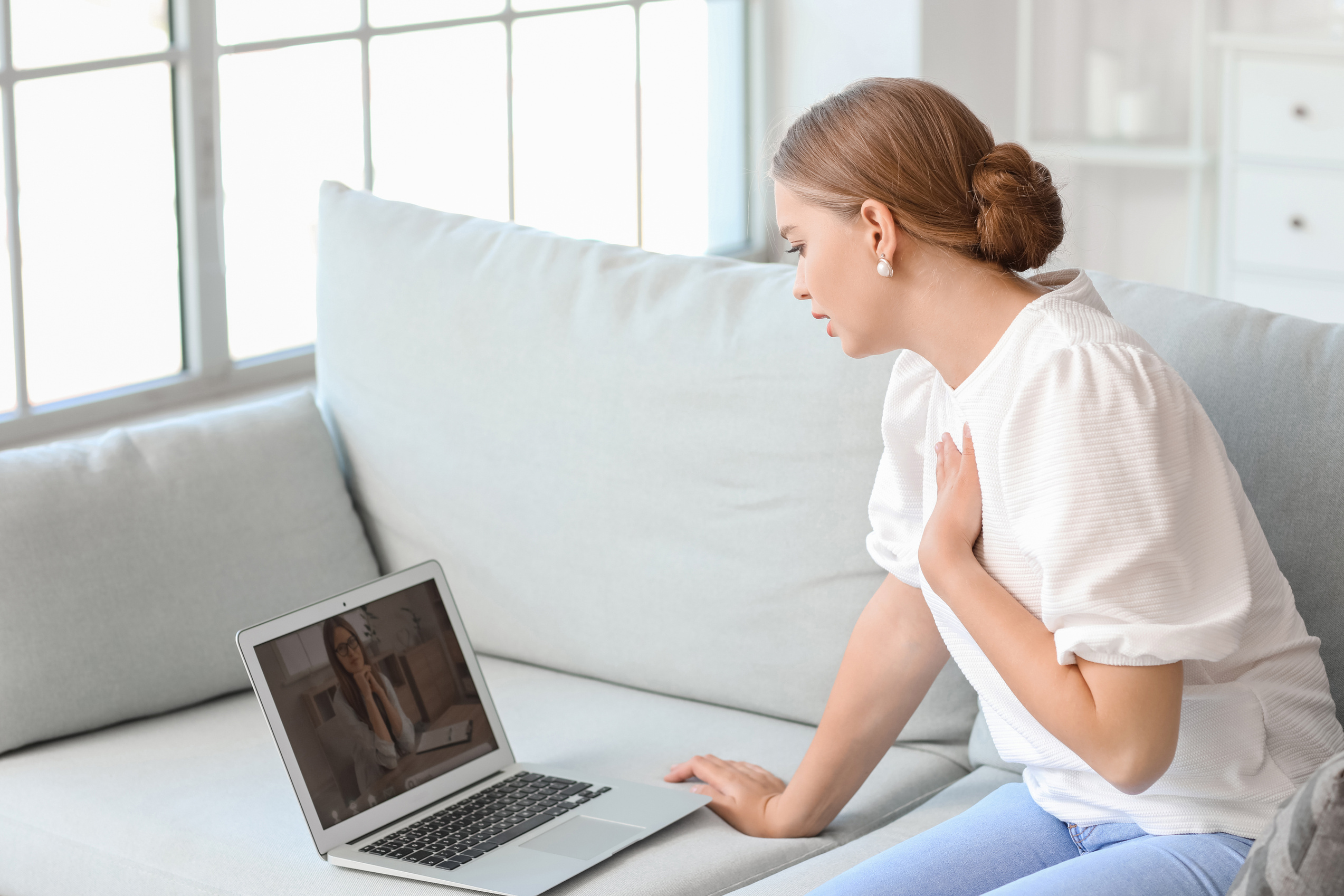 Stressed Young Woman Asking Psychologist for Advice Online at Home